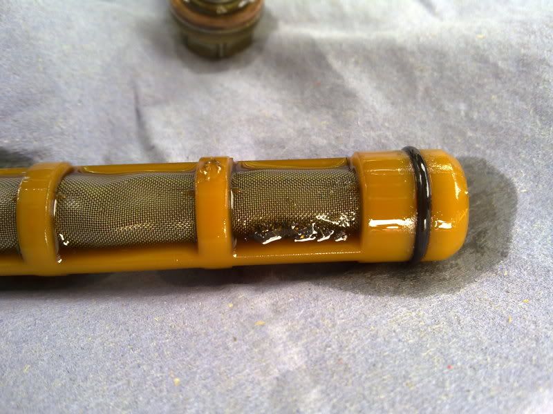 Ktm 525 exc 04 metal shavings on sump plug bolt.